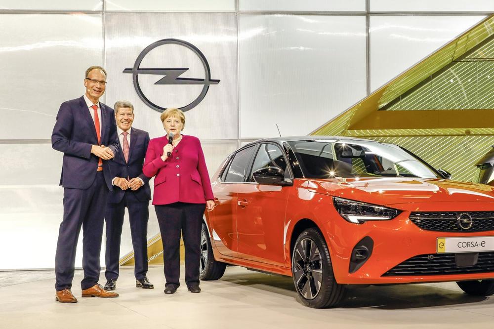 Chancellor Angela Merkel Visits Opel Stand at IAA