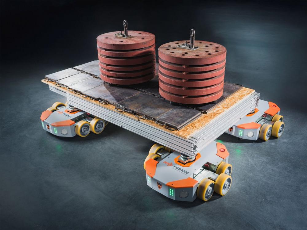 FORMIC transport systems move heavy loads in swarms